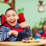 student with cognitive disabilities in a wheelchair